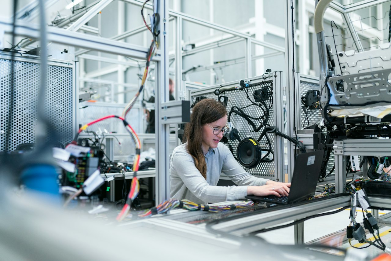 Engineer working in an automated production line